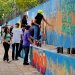 Após oficina de arte, alunos revitalizam muro de escola em Mossoró